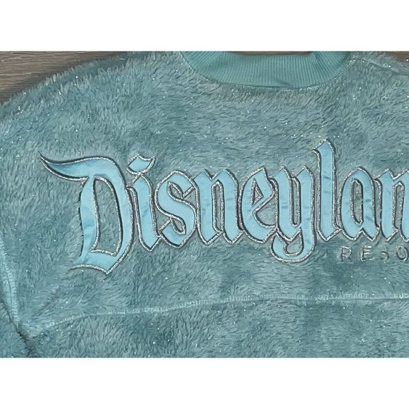 *DISNEYLAND....Sherpa Aqua Fleece SPIRIT JERSEY SPARKLY AQUA COLOR Youth L - Picture 6 of 10
